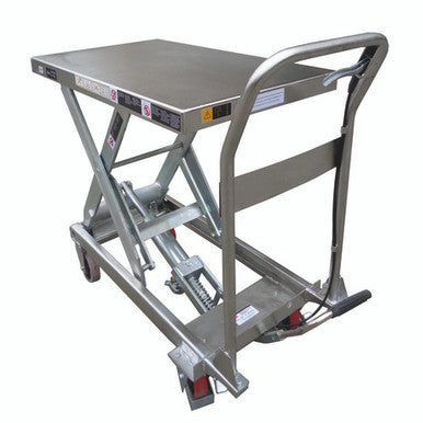 A 450KG stainless steel top scissor lift table (model TF50S) featuring a corrosion-resistant stainless steel tabletop, reinforced steel frame, manual hydraulic lift system, and ergonomic foot pump, designed for safe and hygienic material handling in food processing and industrial environments.