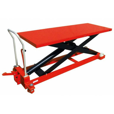 A 1000KG large table scissor lift table (model TG100) featuring a heavy-duty steel frame, manual hydraulic scissor lift mechanism, ergonomic foot pedal, and spacious table surface, designed for efficient and safe heavy load handling in industrial and warehouse settings.